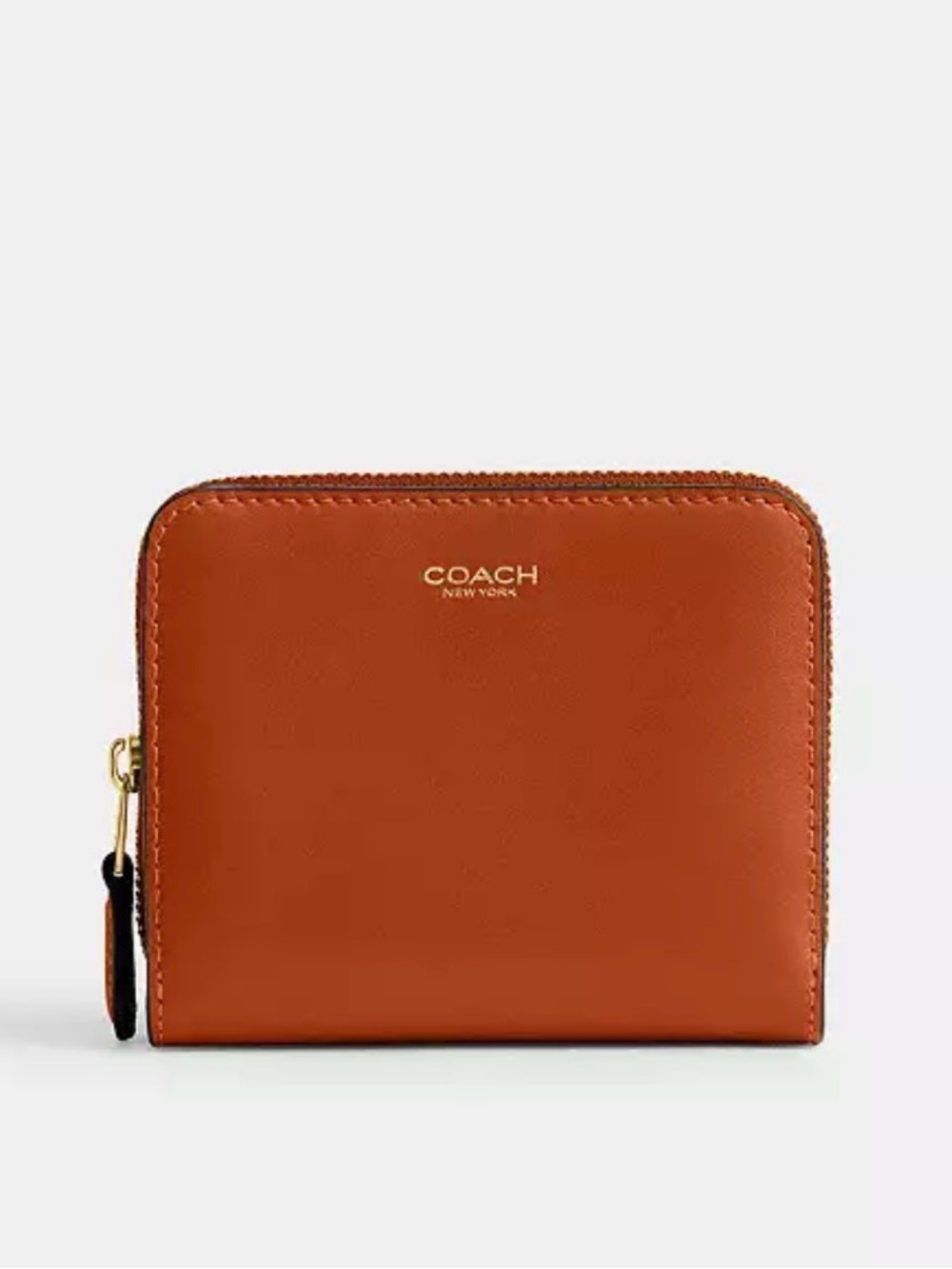 Authentic Coach Essential Billfold Wallet zip in dark peach colour.
